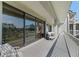 Relaxing balcony with ample space for seating, offering picturesque views of the lake and surrounding greenery at 6330 Masters Blvd # N4, Orlando, FL 32819