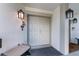 Inviting double front doors enhance curb appeal and welcome you home, featuring overhead lighting and unit number at 6330 Masters Blvd # N4, Orlando, FL 32819