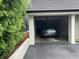 Attached garage providing secure parking for a vehicle and additional storage space at 6330 Masters Blvd # N4, Orlando, FL 32819