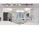 A bright and spacious kitchen with tile floors, stainless steel appliances, and a corner sink at 6330 Masters Blvd # N4, Orlando, FL 32819