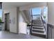 Well-maintained staircase area providing access to upper floors, complemented by an elevator for added convenience at 6330 Masters Blvd # N4, Orlando, FL 32819