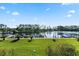 Breathtaking water views from the property, overlooking a marina filled with boats and lush greenery at 6330 Masters Blvd # N4, Orlando, FL 32819