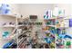 Walk in pantry has metal shelving and is fully stocked at 635 Cheval Ln, Debary, FL 32713