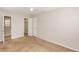 Neutral bedroom featuring carpeted floors and a double-door closet at 845 N Ludlum Dr, Deltona, FL 32725