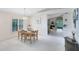 Spacious dining area with bright natural light offering an open layout, ideal for gatherings at 912 Augusta National Blvd, Winter Springs, FL 32708