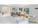 Open living area with large windows and neutral palette offering plenty of natural light at 912 Augusta National Blvd, Winter Springs, FL 32708