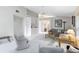 Bright living room features vaulted ceilings, built-in shelving, and neutral tones for a serene atmosphere at 912 Augusta National Blvd, Winter Springs, FL 32708