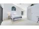 Bedroom with vaulted ceilings, large windows and a view to the outside at 912 Augusta National Blvd, Winter Springs, FL 32708