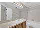 Clean bathroom featuring a single sink vanity and a shower-tub combo at 948 Bird Bay Ct # 102, Lake Mary, FL 32746