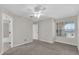 Bedroom featuring carpet, a ceiling fan, and a window at 948 Bird Bay Ct # 102, Lake Mary, FL 32746