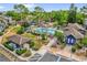 A luxurious community pool featuring lounge chairs, a hot tub, and beautiful green landscaping around the area at 948 Bird Bay Ct # 102, Lake Mary, FL 32746