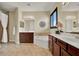 Spacious bathroom features dual vanities, a soaking tub, a walk-in shower, and decorative accents at 955 Holly Springs Ter, Oviedo, FL 32765