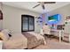 Bedroom with modern desk, television, and plush bed for a relaxing retreat at 955 Holly Springs Ter, Oviedo, FL 32765