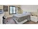 This bedroom features a decorative wall, a window with shutters, and a desk at 955 Holly Springs Ter, Oviedo, FL 32765
