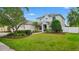 Beautiful two-story home with manicured lawn and garden at 955 Holly Springs Ter, Oviedo, FL 32765