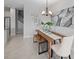 Dining room showcasing modern chandelier, seating, and decor against a neutral wall color at 9972 Red Canoe Aly, Orlando, FL 32832