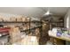 Shed interior reveals ample storage with shelving and organized containers at 1006 Hanging Vine Pt, Longwood, FL 32750