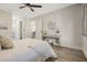 Bedroom featuring a ceiling fan, new floors and decor at 181 Pinewood Cir, Kissimmee, FL 34743