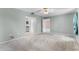 This bedroom features an entrance to the bathroom and a view of the hallway at 2244 Silver Lakes N Dr, Lakeland, FL 33810