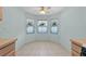 A kitchen breakfast nook with tiled floors and bay windows at 2244 Silver Lakes N Dr, Lakeland, FL 33810