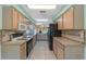 Efficient kitchen with updated appliances and ample cabinet space, with a bright and airy feel at 2244 Silver Lakes N Dr, Lakeland, FL 33810