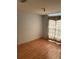 Bedroom featuring laminate flooring and window with natural light at 2342 Cilantro Dr, Orlando, FL 32837