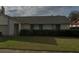 Single-story home featuring brick accents, a well-maintained lawn, and mature landscaping at 2342 Cilantro Dr, Orlando, FL 32837