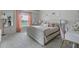 Beautiful bedroom with a comfortable bed, curtains, and a makeup table at 2407 Oakington St, Winter Garden, FL 34787