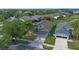 Charming single Gathering home, manicured lawn, and two car garage on a quiet street, promising suburban living at 2407 Oakington St, Winter Garden, FL 34787