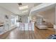 Living room with bar seating, skylight, and modern sofa set at 2407 Oakington St, Winter Garden, FL 34787