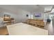 Open-concept living room with vaulted ceilings, hardwood floors, and modern decor at 2407 Oakington St, Winter Garden, FL 34787