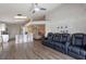 Spacious open-concept living room with high ceilings and luxury seating for relaxing and entertaining guests at 2407 Oakington St, Winter Garden, FL 34787