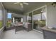 Cozy outdoor patio with comfortable seating, perfect for relaxing and enjoying the outdoor scenery at 2407 Oakington St, Winter Garden, FL 34787