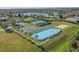Aerial view of community sports courts, including tennis, basketball, and hockey at 2407 Oakington St, Winter Garden, FL 34787