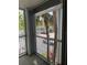 Balcony with views of lush palm trees and parking at 2516 Grassy Point Dr # 210, Lake Mary, FL 32746