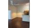 Open floor plan featuring sleek hard surface floors in the living and kitchen area at 2516 Grassy Point Dr # 210, Lake Mary, FL 32746