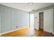 Bright bedroom featuring neutral walls, wood floors and a closet, ready to be made your own at 2647 S Myrtle Ave, Sanford, FL 32773