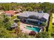 Backyard oasis featuring a pool, gazebo, patio and screened lanai at 2828 Marquesas Ct, Windermere, FL 34786