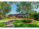 Backyard with lake views, large home, gazebo, and mature landscaping at 2828 Marquesas Ct, Windermere, FL 34786