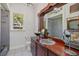 Bathroom featuring custom cabinets, sink, tile floors and tub with shower at 2828 Marquesas Ct, Windermere, FL 34786
