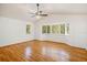 Bright bedroom with vaulted ceiling, hardwood floors, and a bay window offering a pleasant view at 2828 Marquesas Ct, Windermere, FL 34786