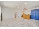 Spacious living room with white walls, marble floors, ceiling fan, and stairs to other levels at 2828 Marquesas Ct, Windermere, FL 34786