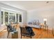 Bright living room with a bay window, hardwood floors, and stylish furnishings at 2828 Marquesas Ct, Windermere, FL 34786