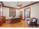 Office with a large desk, hardwood floors, and lots of natural light at 2828 Marquesas Ct, Windermere, FL 34786