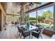 Bright patio features a spiral staircase and overlooks a sparkling swimming pool at 2828 Marquesas Ct, Windermere, FL 34786