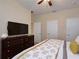 Bathroom with granite counters, a shower with glass door, toilet and updated fixtures at 2919 Banana Palm Dr, Kissimmee, FL 34747