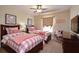 Shared bedroom with two beds, a ceiling fan, a window and television at 2919 Banana Palm Dr, Kissimmee, FL 34747