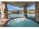 Hot tub in grotto with access to a community resort style swimming pool and other community amenities at 2919 Banana Palm Dr, Kissimmee, FL 34747