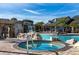Resort-style pool and hot tub area with lush landscaping at 2919 Banana Palm Dr, Kissimmee, FL 34747