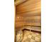 Sauna room with wooden walls and flooring, bench seating, and heater at 2919 Banana Palm Dr, Kissimmee, FL 34747
